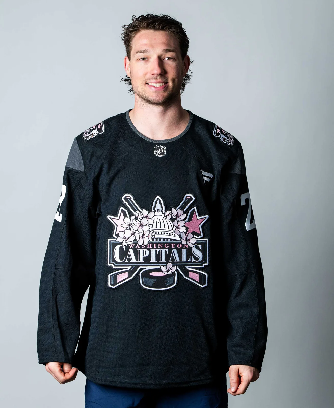 Brandon Duhaime wearing the new Capitals springtime jersey
