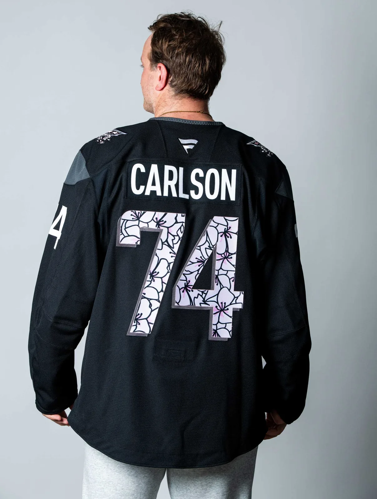 John Carlson wearing the new Capitals springtime jersey