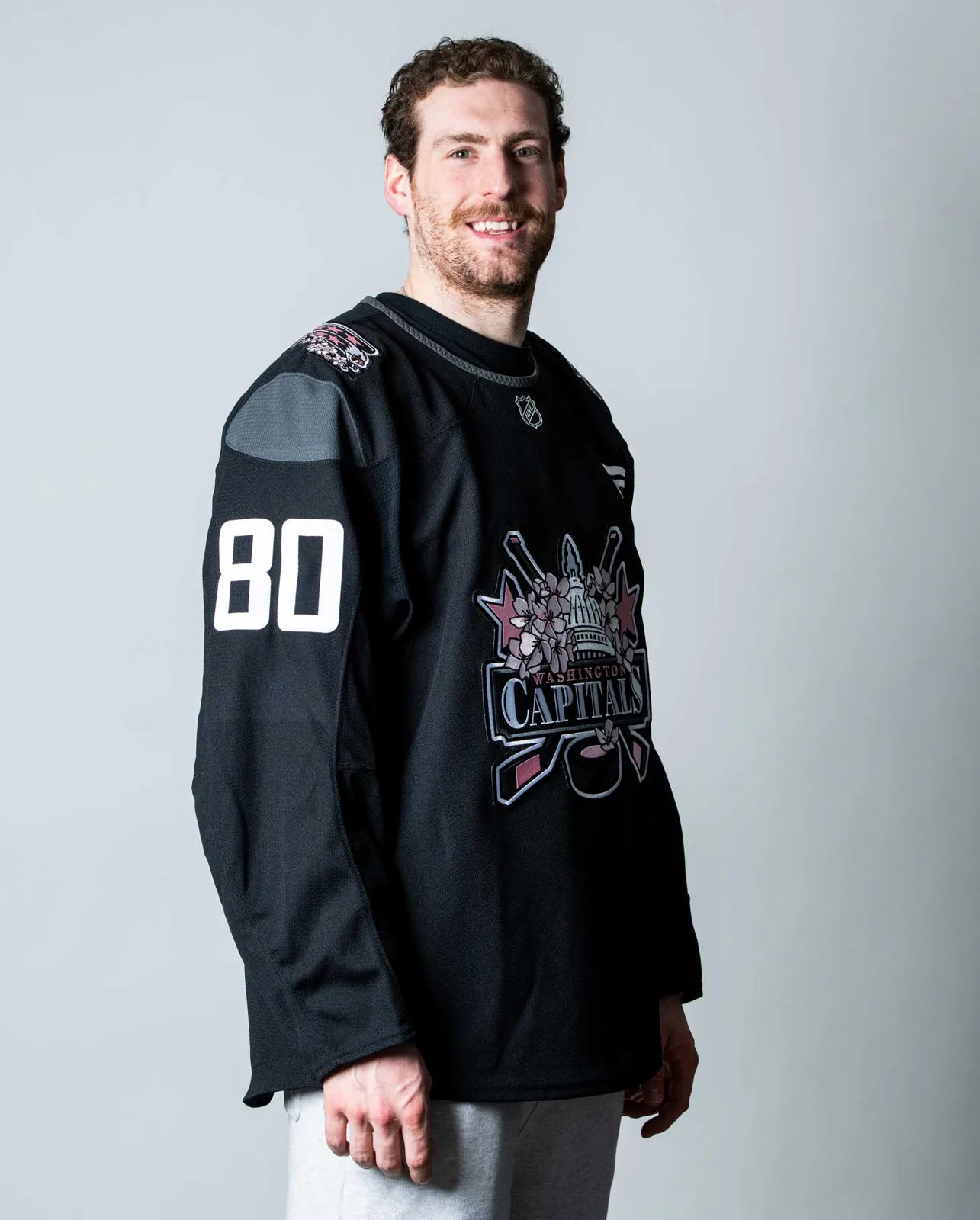 Pierre-Luc Dubois wearing the new Capitals springtime jersey